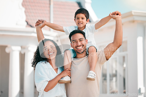 Image of Happy, love and portrait of a family in the backyard for outdoor fresh air by their modern house. Happiness, smile and boy child bonding and posing with his parents in the garden by their home.