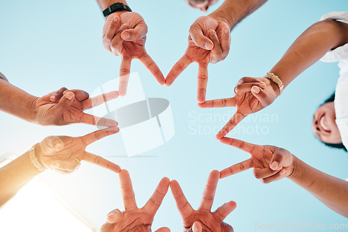 Image of Star, hands and business people with peace sign on sky background for teamwork, solidarity or commitment from blow. V, sign and team with emoji shape in collaboration, partnership or goal motivation