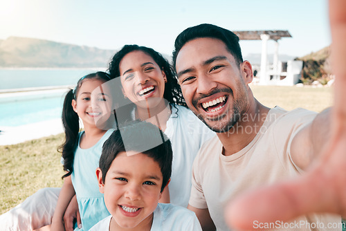 Image of Selfie of mom, dad and kids at holiday accommodation at ocean for picnic, bonding and fun smile together. Digital photography, happy family and quality time vacation in yard of beach house in Mexico.