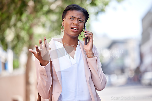 Image of Phone call, frustrated and confused black woman employee angry at contact or bad news on mobile conversation. Street, city and young worker with stress talking about a fail project or mistake