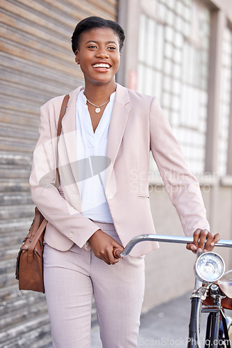Image of Business woman in city with bicycle, smile and sustainable morning commute walking on sidewalk. Eco friendly transport bike, cycling and happy African girl with urban transportation on work travel.