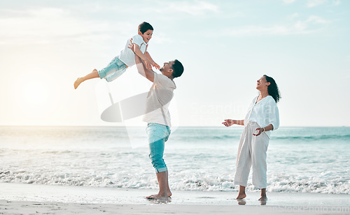 Image of Family, beach and father lifting boy child with love, freedom and travel celebration in nature. Flying, fun and parents with kid at the ocean for bond, happy and airplane game while traveling in Bali