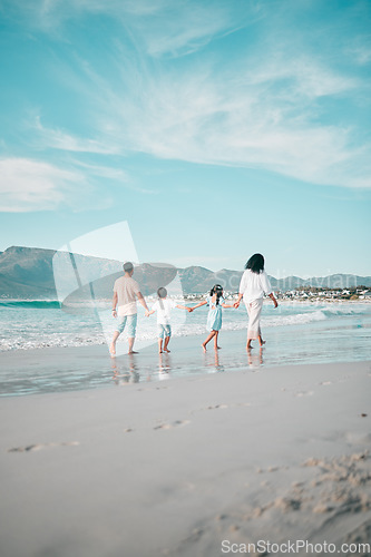 Image of Family is walking on beach, hand holding and back view, ocean and bonding on holiday, freedom and travel. Parents, young children and solidarity on tropical vacation in Mexico, love and care outdoor