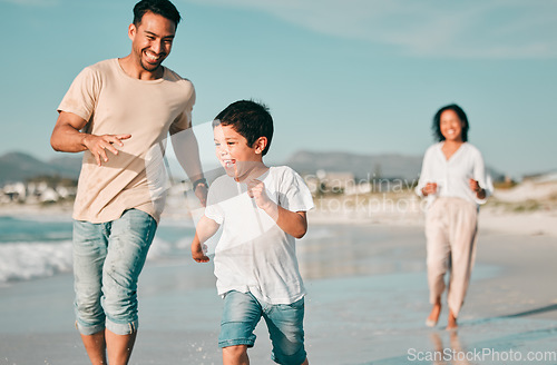 Image of Family, father and son running on beach with mother, ocean and energy with bonding on holiday, happiness and freedom. Parents, boy and carefree on tropical vacation in Mexico, love and care outdoor