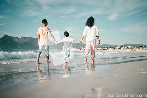 Image of Holding hands, walking and family and the beach from behind with freedom, vacation and fun at the sea. Ocean, back and boy child together with parents in Mexico for travel, bond or summer holiday