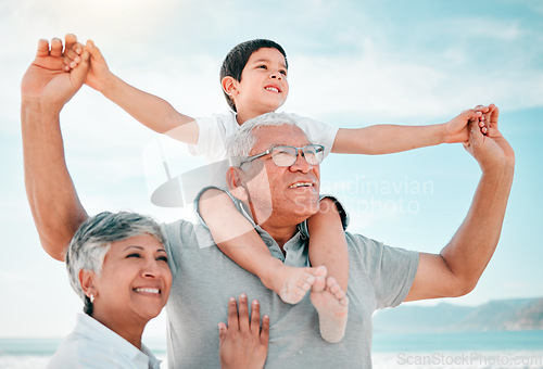 Image of Beach, family and child on grandfather shoulder with grandmother outdoor, love and bond on holiday. Summer, happiness and people in nature, tropical vacation in Mexico with old man, woman and boy kid