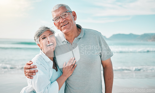 Image of Happy, hug or portrait of old couple on beach with love, care or support on summer vacation holiday in nature. Retirement, mature man or senior woman at sea or ocean to travel on holiday together