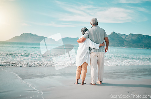 Image of Back, hug or old couple on beach to relax with love, care or support on summer vacation in nature. Retirement, mature man or senior woman at sea or ocean to travel on holiday together looking at view