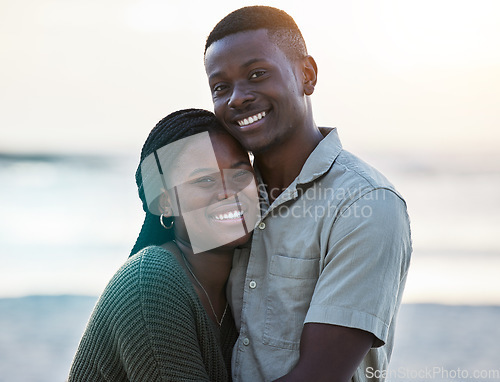 Image of Black couple, happy and portrait outdoor at the beach with love, care and commitment. Smile on face of young african man and woman together on vacation, holiday or sunset travel adventure in Jamaica