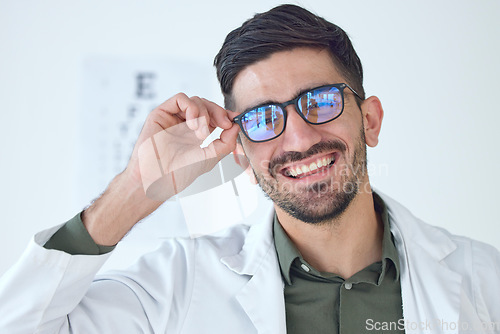 Image of Face, man and happy optometrist with glasses for vision, healthcare or wellness. Portrait, smile and doctor of ophthalmology with frame, expert optician or medical professional for eye care in clinic