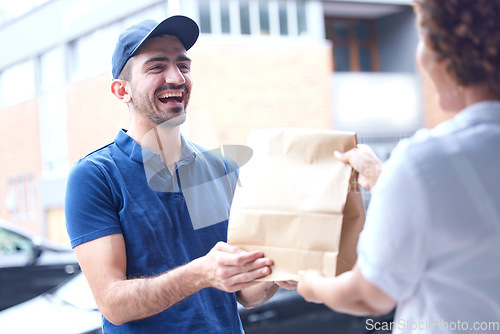 Image of Happy man, delivery and paper bag in the city for courier service, fast food or online shopping at the door. Male person giving customer parcel, package or order for transport, logistics or ecommerce