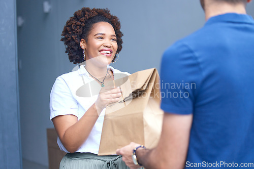 Image of Happy woman, package and delivery man by door for order, fast food or parcel in ecommerce at home. Female person or customer receiving paper bag, cargo or collection from courier guy by entrance