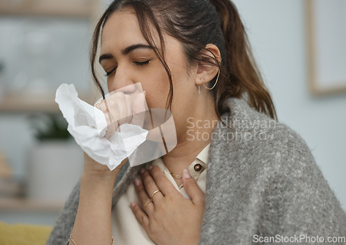 Image of Woman with cough, tissue and sick with health problem, flu or allergies, chest pain and asthma at home. Young female with fever, bacteria in lungs and virus, infection and sinus with tuberculosis