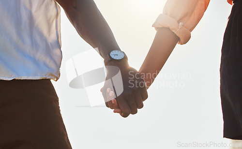 Image of Love, flare and African couple holding hands, bonding and enjoy outdoor romantic quality time together. Peace, freedom and sunshine for calm black woman, man or people on marriage anniversary date