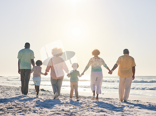 Image of Family on the beach, holding hands and generations, travel and summer vacation, solidarity and love outdoor. Grandparents, parents and children on holiday, people together with back view in Cancun