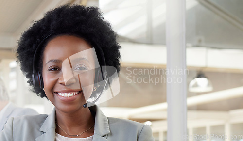 Image of Black woman, face and working in call center, contact us and CRM, happy with customer service job in portrait. Female employee in workplace, headset and communication, help desk consultant in office