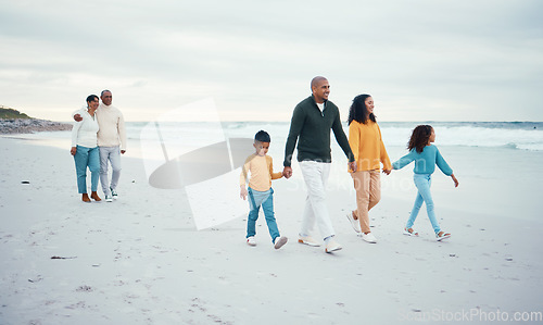 Image of Family, happy and children walking on beach enjoy holiday, travel vacation and weekend together. Ocean, smile and grandparents, parents and kids holding hands for bonding, quality time and relax