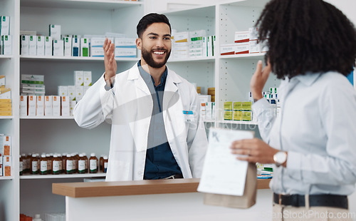Image of Customer service, counter and pharmacist man with medicine, expert advice or healthcare support. Happy doctor, medical professional or friendly retail person in pharmacy talking to woman at help desk