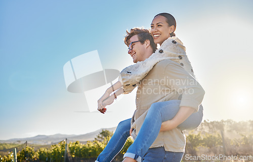 Image of Couple, interracial and love with adventure outdoor, piggyback and smile while on holiday with summer and sun. Relationship, commitment and care with man and black woman, happy with peace and travel.