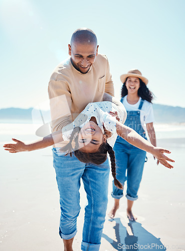 Image of Family, beach and parents play with girl for bonding, quality time and adventure together by ocean. Travel, love and happy mom, dad and child enjoy summer holiday, vacation and relax on weekend