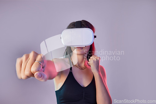 Image of Vr, fitness and woman boxing in metaverse studio isolated on a purple background mockup. 3d exercise, virtual reality and female fighting or punching with futuristic technology for esports gaming.