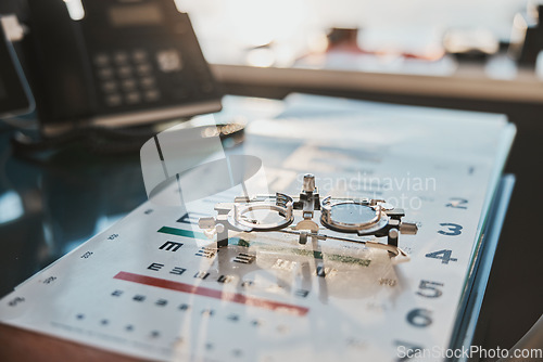 Image of Ophthalmology, vision and optometry equipment with lenses and letter chart for examination test or exam for glasses. Eyesight, eyewear and medical tools for prescription spectacles or eye care