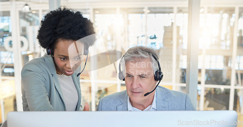 Image of Help desk, teamwork and opinion, black woman with man at computer at call center. Customer service consultant team at online office, support and training at advisory agency with diversity and trust.