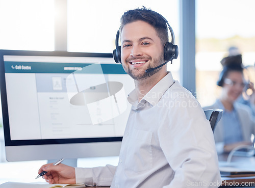 Image of Man at call center, contact us with customer service employee, smile and CRM with consultant in workspace. Professional, portrait and communication, male with headset with help desk and telemarketing