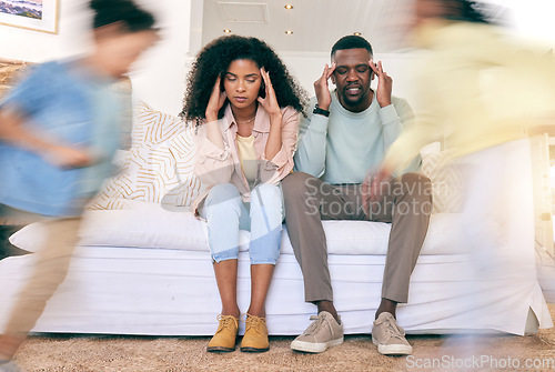 Image of Children, running and tired parents on sofa with motion blur for energy, playing and hyper kids in living room. Black family, stress and mom and dad with headache, frustrated and fatigue at home