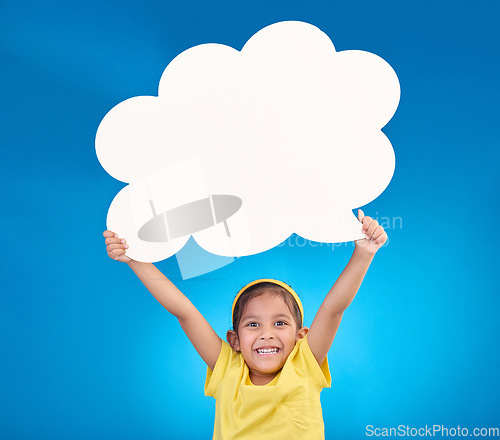 Image of Speech bubble, thinking and portrait of child with idea, opinion and announcement on blue background studio. Talking, speaking mockup and excited, happy and young girl with smile, poster and banner