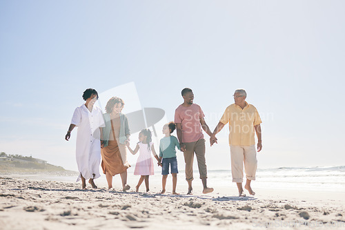 Image of Grandparents, parents and children walking on beach holding hands for love, support and quality time together. Travel, happy and kids with big family by ocean for holiday, summer vacation and weekend