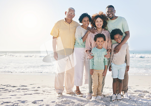 Image of Smile, hug and portrait of a happy family at a beach for travel, vacation and holiday on nature background. Relax, face and trip with children, parents and grandparents bond while traveling in Cancun