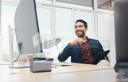 Image of Corporate asian man, computer and smile in office for email communication, schedule and tablet. Entrepreneur, businessman and focus by desktop for web design, happy or vision with digital touchscreen