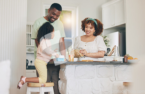 Image of Family home, kitchen and child helping mom and dad with meal in the morning. Happy mother, father and young girl together with parent love, care and bonding with a kid and talking with a smile