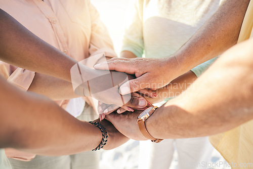 Image of Group of people hands stacked outdoor for teamwork, community support and collaboration in prayer or faith. Circle of friends closeup with hand together sign for solidarity, praying and team building