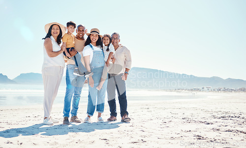 Image of Portrait of grandparents, parents and children at beach for bonding, quality time and relax together by sea. Big family, travel and happy mom and dad with kids on summer holiday, vacation and weekend