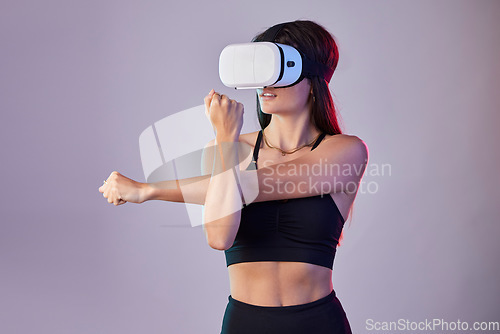 Image of Virtual reality, fitness and woman stretching in metaverse studio isolated on a purple background. 3d exercise, vr and female athlete warm up, workout or training with futuristic headset for esports.