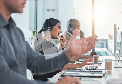 Image of Call center, friendly and consulting with woman in office for customer service, communication and help desk. Happy, contact us and technical support with employee at computer for crm, sales or advice