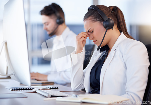 Image of Tired girl, headache or call center consultant with burnout is overworked by telemarketing deadline at help desk. Depressed or exhausted woman frustrated with job stress, migraine pain or fatigue