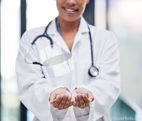 Image of Ask, hands and open doctor in a hospital need help with donation, trust and support in a clinic with care. Medical, welcome and woman healthcare professional or worker with empty palm as trust