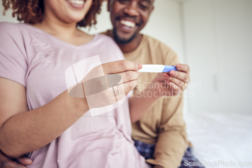 Image of Pregnancy test in hands, happiness with fertility and people having a baby, happy couple with love and care at home. Interracial, black man and pregnant woman, start family with new mother and father