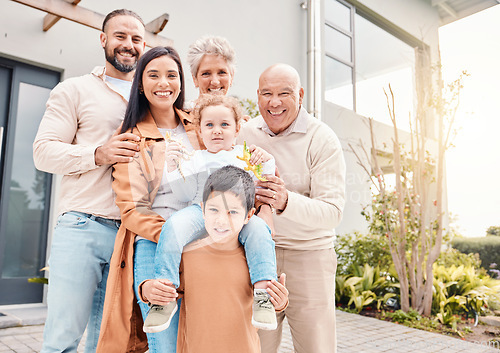 Image of Portrait, house and family with happiness, quality time and love outdoor, cheerful or joyful. Face, grandparents or mother with father, siblings or children with home, care or bonding with investment