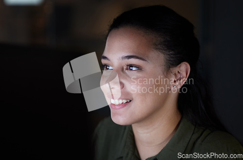 Image of Happy, online and woman working at night in office, excited for solution or creative idea on dark background. Startup, smile and female leader with business goal, excited and cheerful reading email