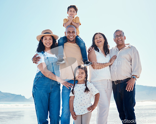 Image of Portrait, beach and black family having fun outdoor in nature together on vacation during summer. Happy, smile or love with children, parents and grandparents bonding on the coast for a holiday
