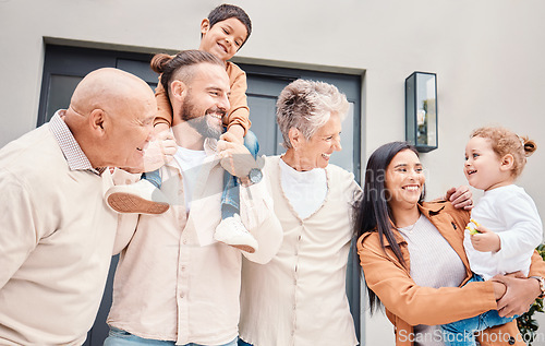 Image of Family, love with children, parents and grandparents bonding outside of their home together during a visit. Kids, garden or summer with a group of happy people standing on real estate outdoor