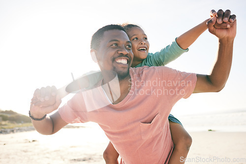 Image of Child, black man and piggy back on beach on playful family holiday in Australia with freedom, fun and energy. Travel, fun and happy father and girl with smile playing and bonding together on vacation