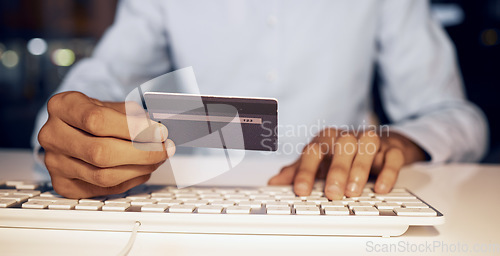 Image of Online shopping, computer keyboard and man hands with credit card for digital bank payment, fintech or finance sale. Night, ecommerce banking trade and customer search retail product on store website