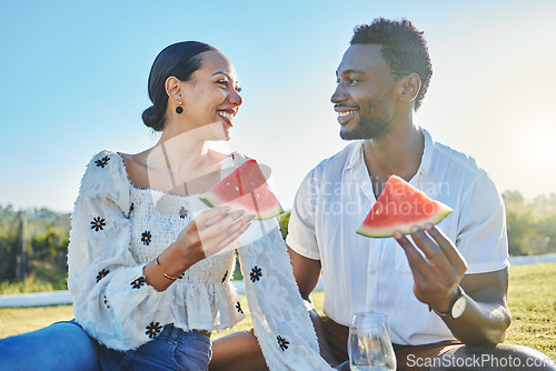 Image of Watermelon, love or black couple on a picnic to relax on a summer holiday vacation in nature or grass. Partnership, romance or happy black woman enjoys traveling or bonding with a funny black man