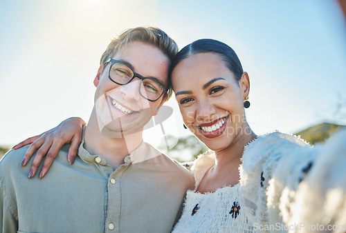 Image of Selfie, love and portrait of couple in park for quality time on weekend, holiday and vacation in summer. Dating, nature and interracial man and woman taking photo for affection, bonding and romance