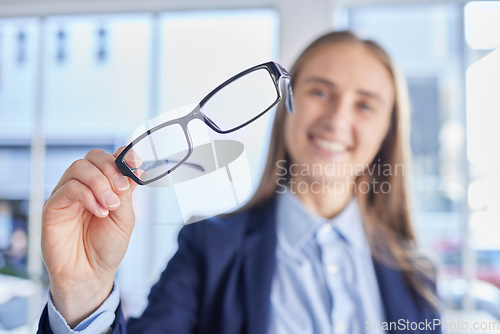 Image of Optometry, eyesight and portrait of woman with spectacles with prescription lens after eye test. Healthcare, vision and female patient or customer holding glasses frame for eye care in optical store